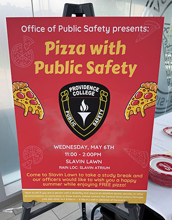 a sign of the pizza with public safety event